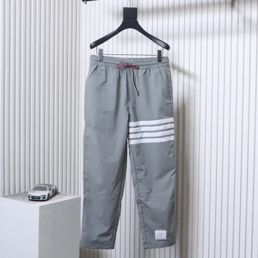 TB Four-Stripe Nylon Drawstring Pants