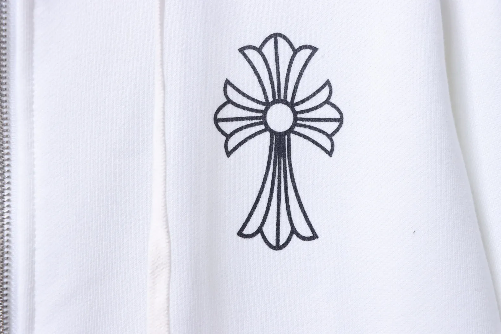 Cross Logo Detail