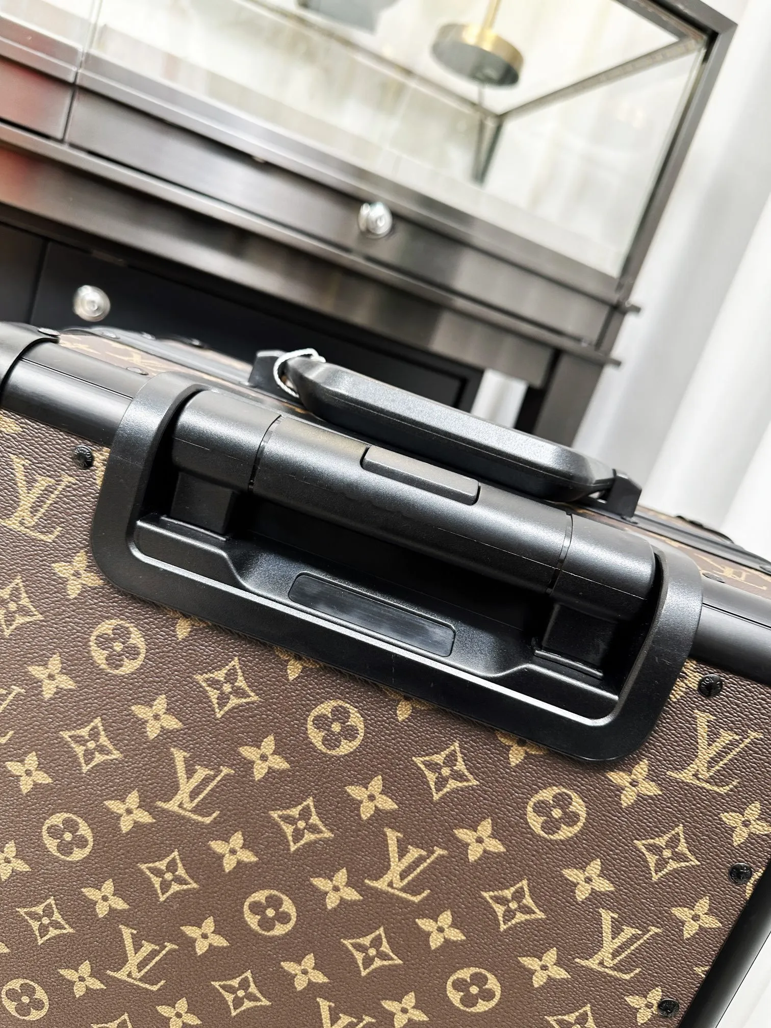Classic monogram luggage top handle detail