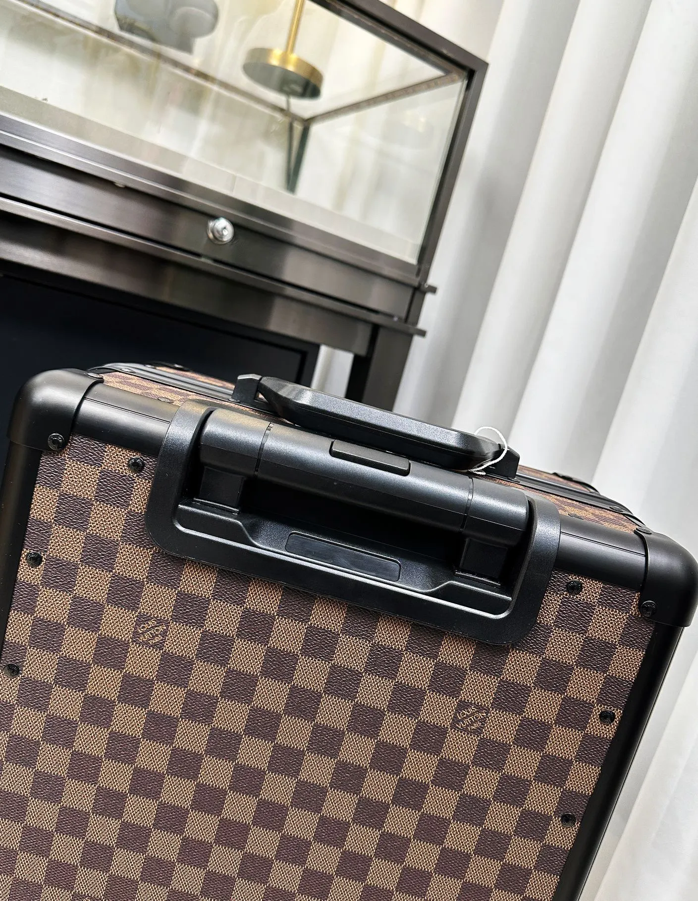 Damier Ebene luggage top handle detail