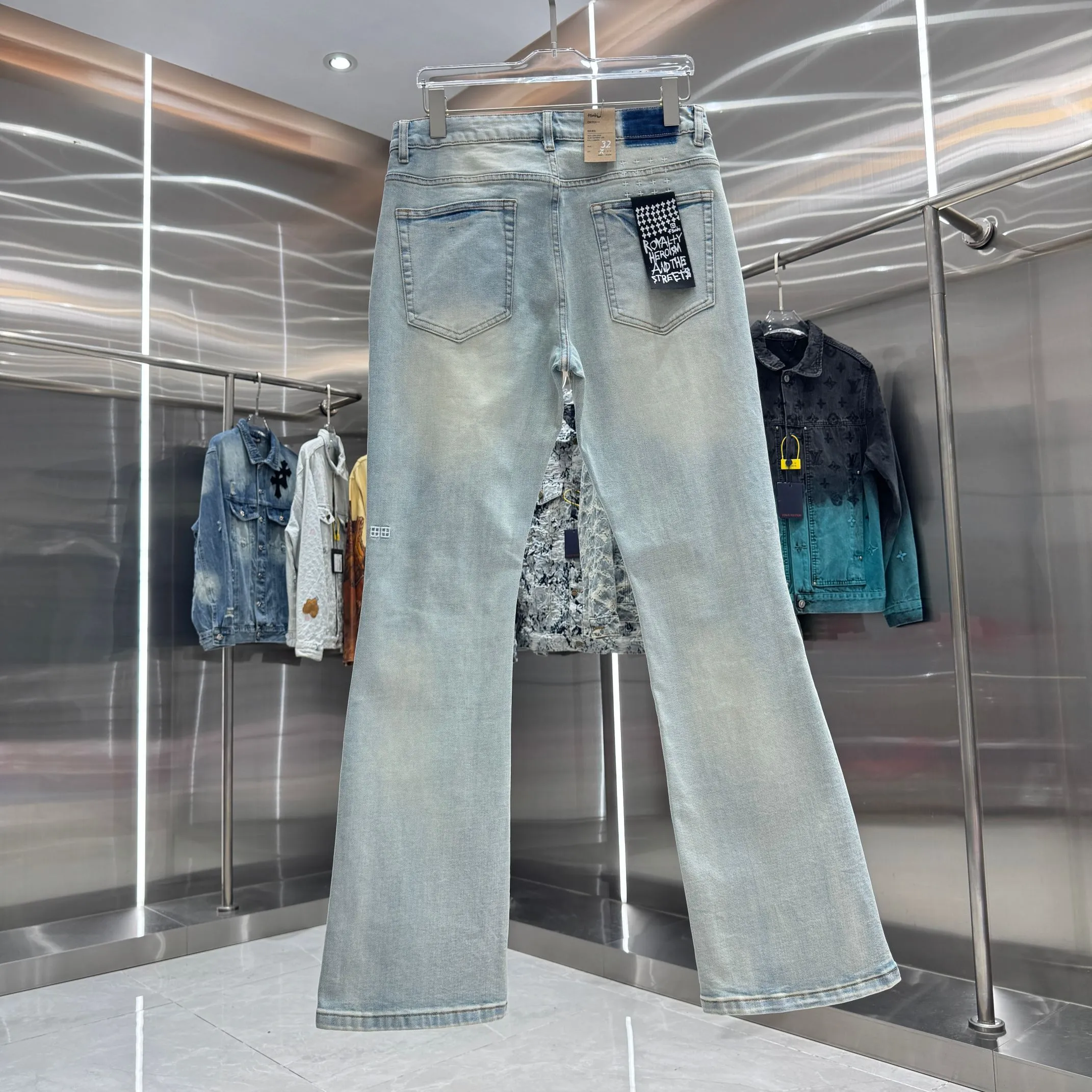 Back View Ksubi Ripped Logo Flare Jeans