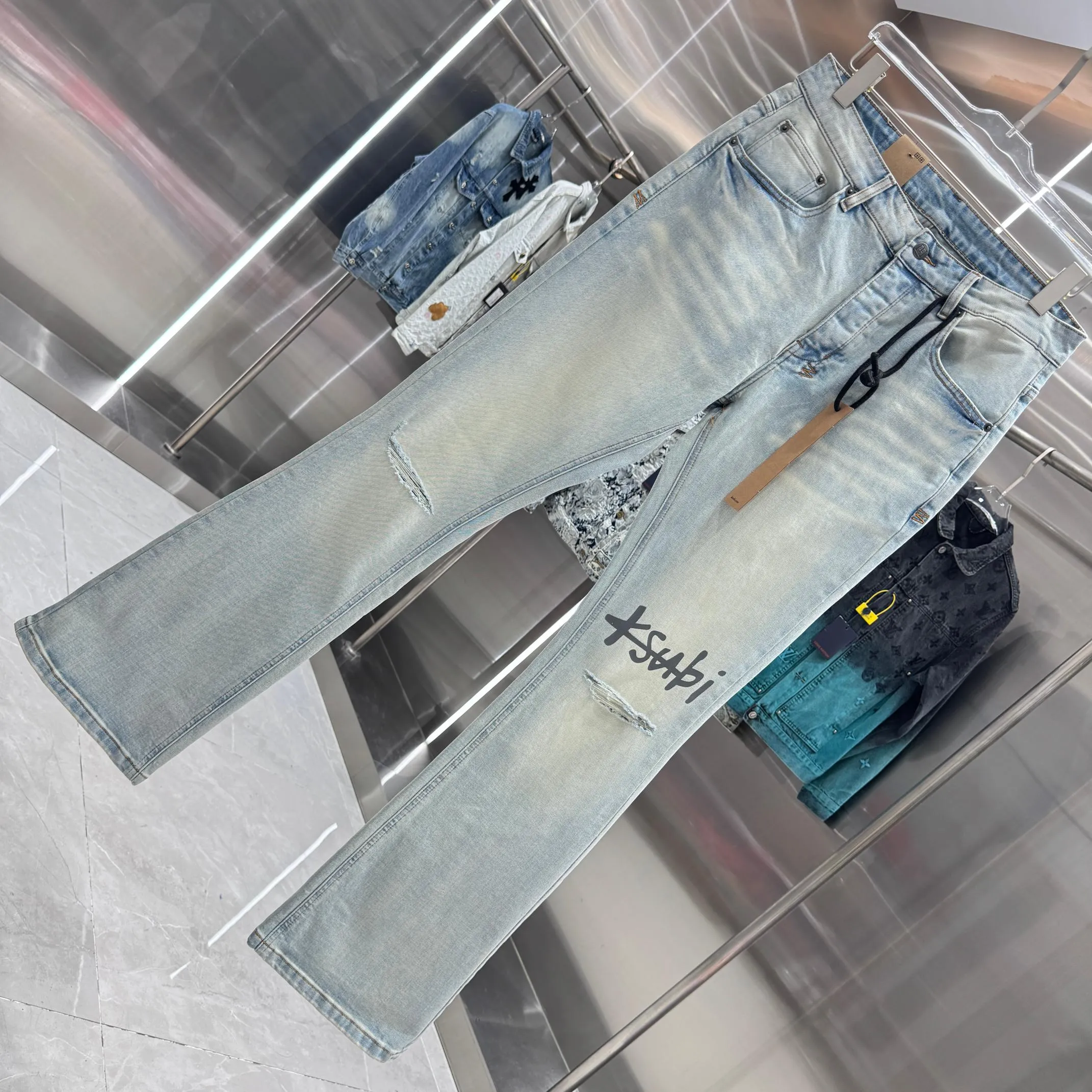Ksubi Ripped Logo Flare Jeans Angeled View