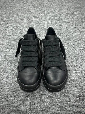 R 0wens Jumbolace Leather Low Sneakers All Black Profile View