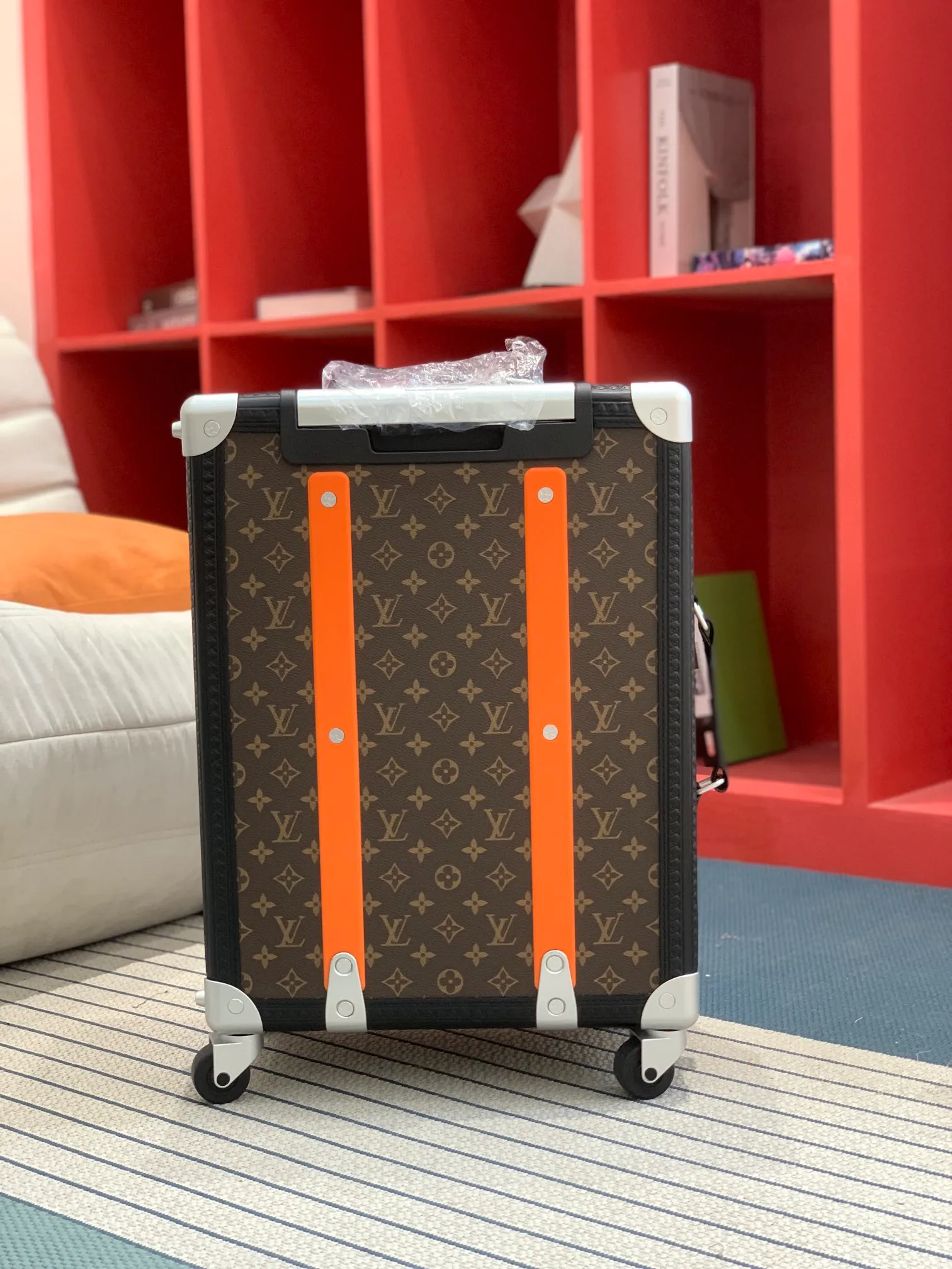Monogram rolling trunk rear view