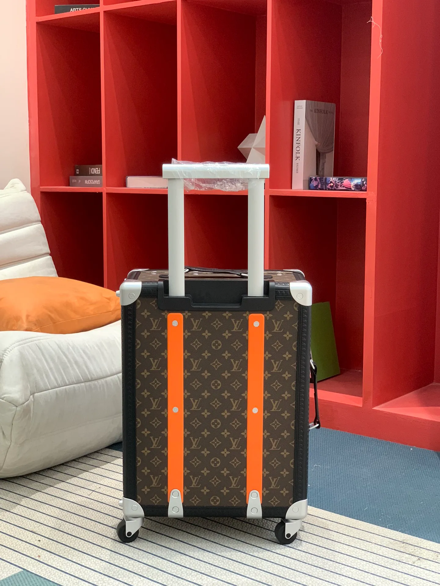 Monogram rolling trunk extended handle view