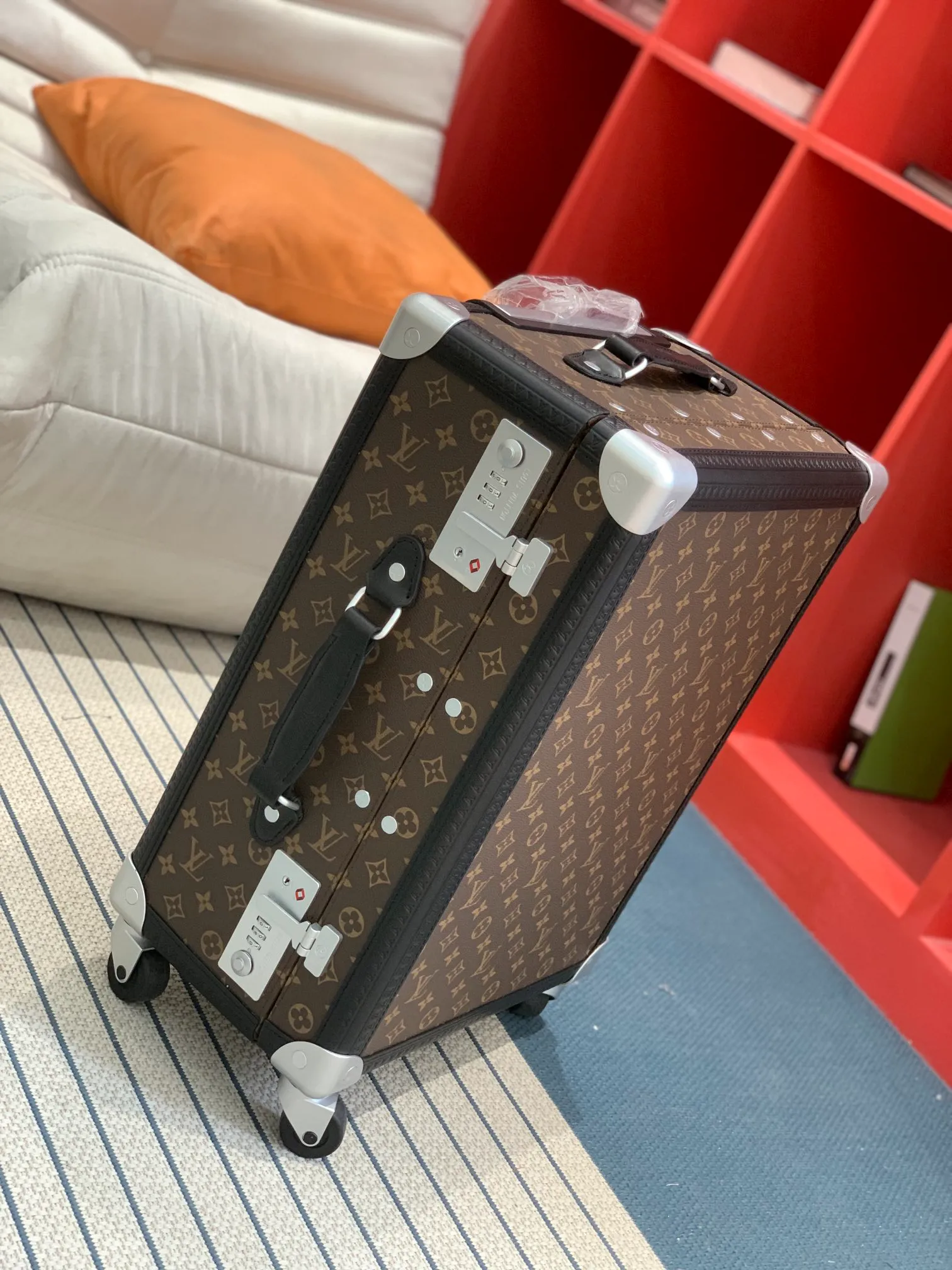 Monogram trunk corner and handle detail