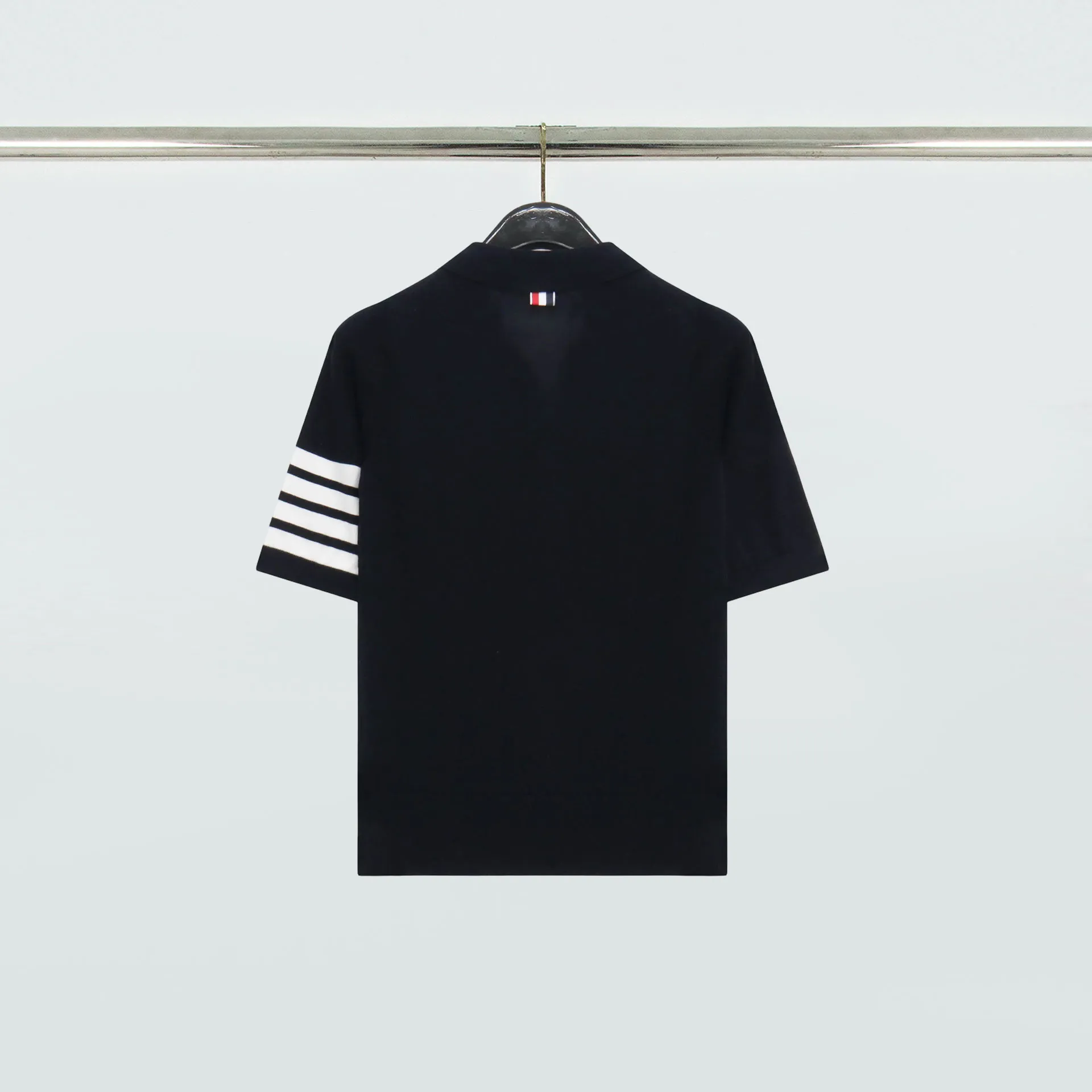 Back View TB Tennis Racket Four-Bar Polo T-Shirt