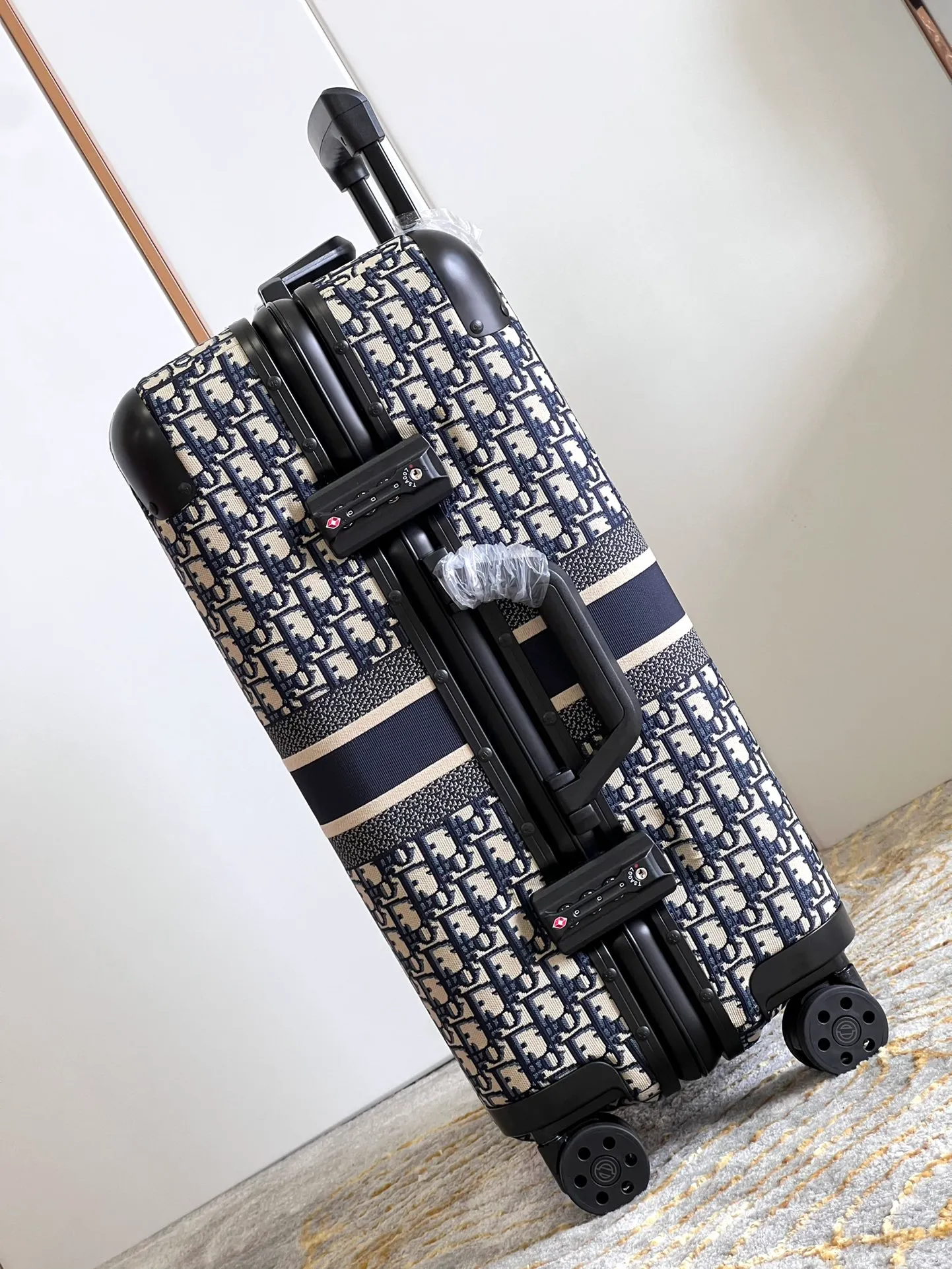 D301 Monogram Rolling Suitcase Side View