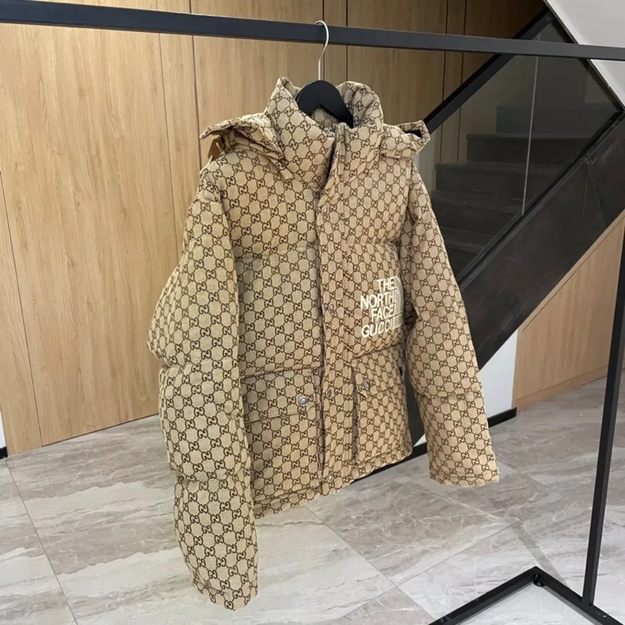 Side View TNF x TUN BE LIFE Monogram Embroidered Down Puffer Jacket